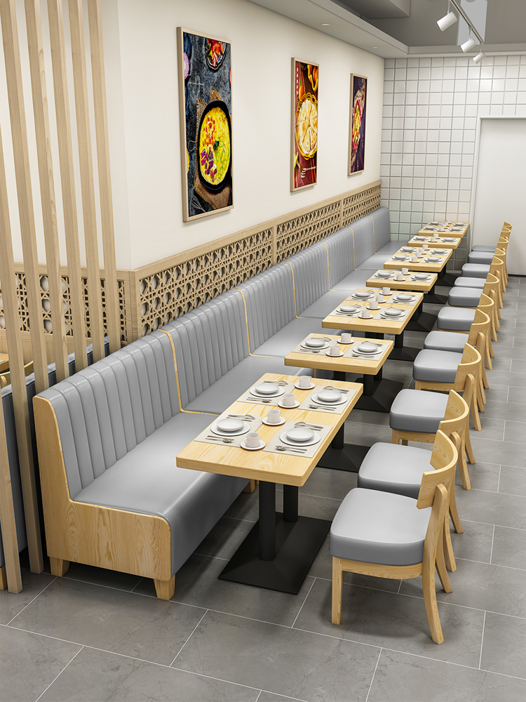 Custom restaurant booth seating and modern dining chairs for commercial hospitality project