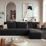 Modern dark grey sectional sofa in a bright contemporary living room setting - Maylo Furniture