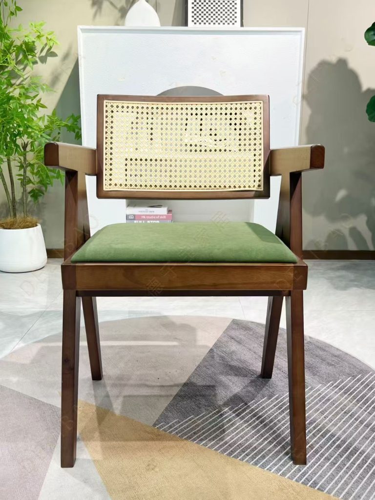 Modern rattan armchair with solid wood frame and green upholstered seat for hotel - Maylo Furniture