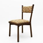 Modern wooden dining chair with textured fabric upholstery and decorative ball-top frame for restaurant seating - Maylo Furniture