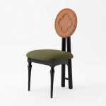 Modern wooden dining chair with clover-shaped backrest and upholstered seat for restaurant interior - Maylo Furniture