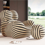 Modern striped designer lounge chair with matching ottoman for contemporary living room or artistic interior space - Maylo Furniture
