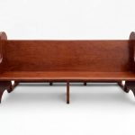 Custom solid wood church pew bench with elegant carved ends and warm wood finish - Maylo Furniture